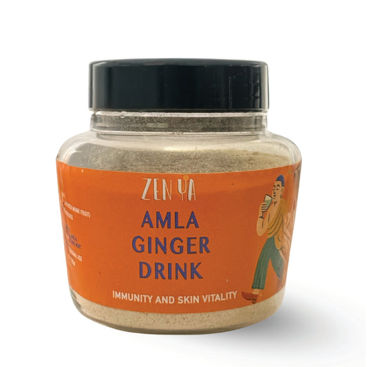 Jar of zenya Amla Ginger Drink with orange label and black lid on a white background