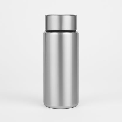 Stainless steel water bottle with silver cap on a light gray background
